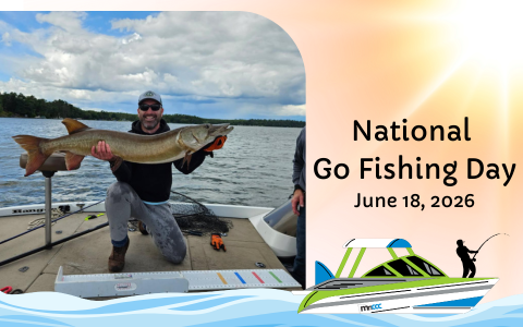 A person kneels on a fishing boat holding a large muskie horizontally across their arms. The lake and a tree-lined shore are visible in the background. On the right side of the graphic, text reads “National Go Fishing Day, June 18, 2026,” accompanied by an illustration of a boat and an angler casting a fishing line.